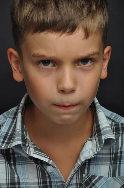 Emotional beautiful boy in the studio — Stock Photo, Image