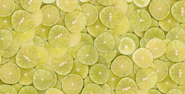 Sliced Green Limes Stacked Top Each Other Piles —  Fotos de Stock