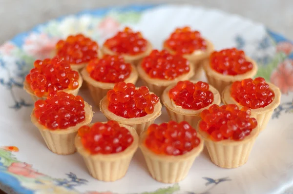 Tartlets with red caviar Stock Picture