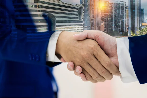 Close Handshake Abstract City Background Teamwork Concept Double Exposure Filtered — Stockfoto