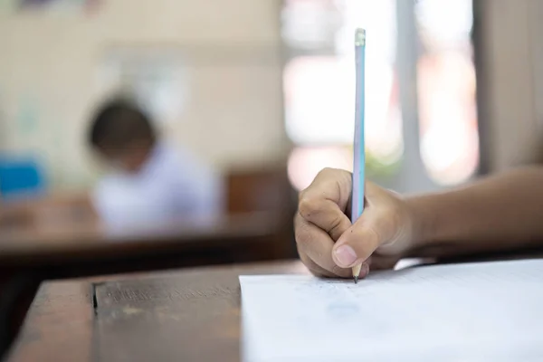 Small School Boy Writing Homework School Workbook Focus Hand Holding — Stock Photo, Image