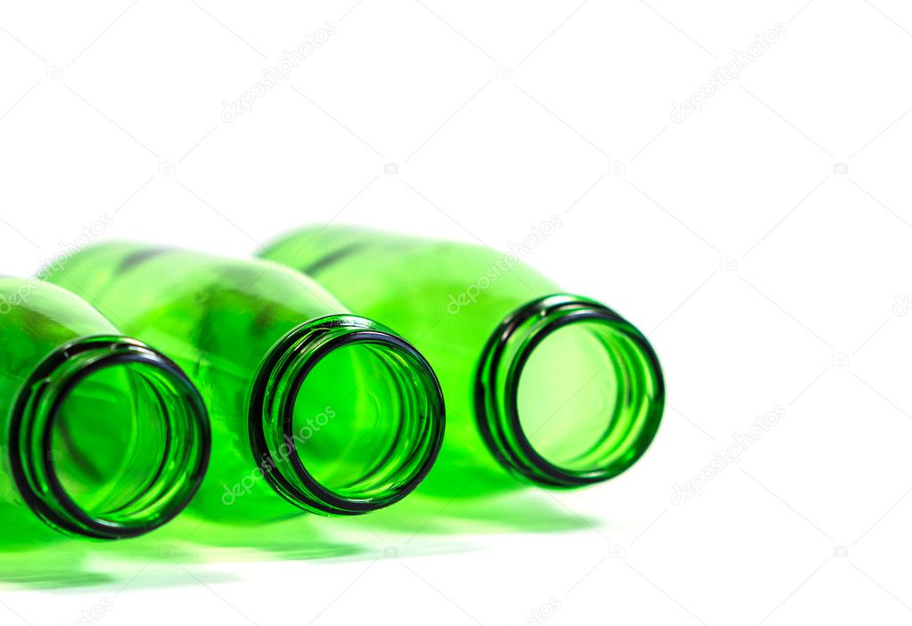 Three Green Bottles Lay Down on White Background