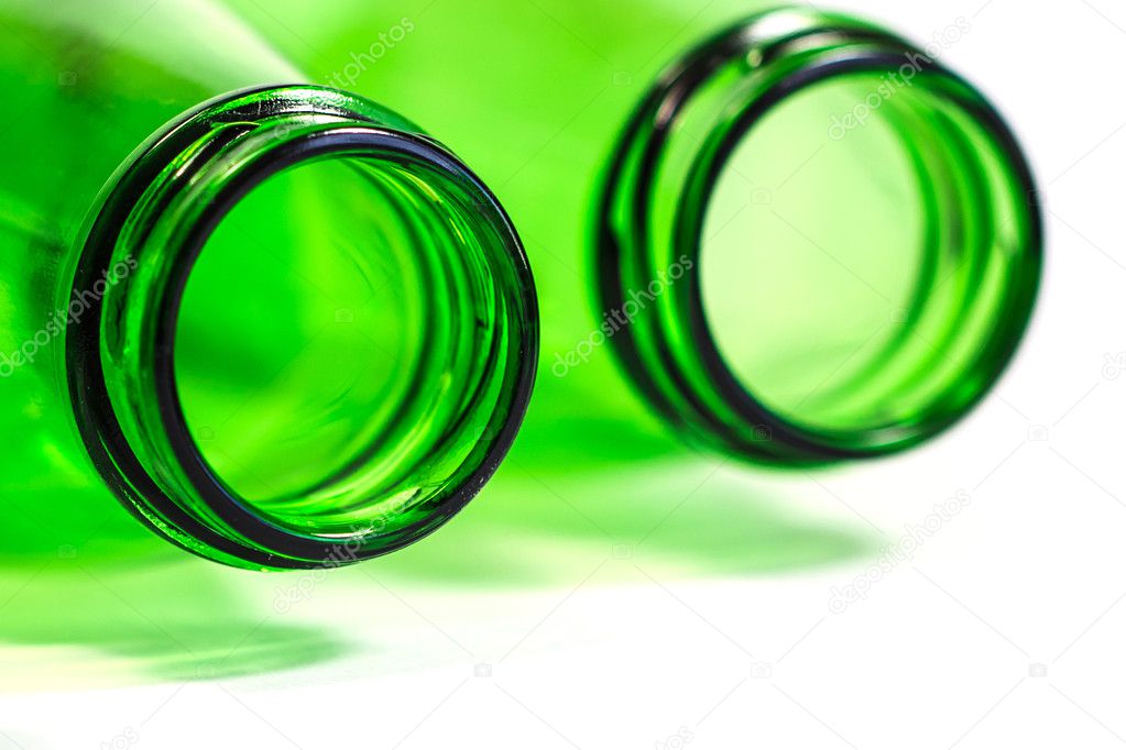 Extra Closeup of Green Bottles on White Background with focus on Left bottle