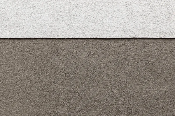 Kaksi sävyjä ruskea rakenne betoniseinään — kuvapankkivalokuva