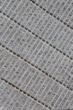 çapraz çizgiler paterni gösteren oluklu beton arka plan