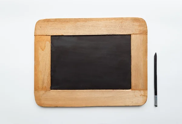 Old vintage wooden frame blank slate and pencil — Stock Photo, Image