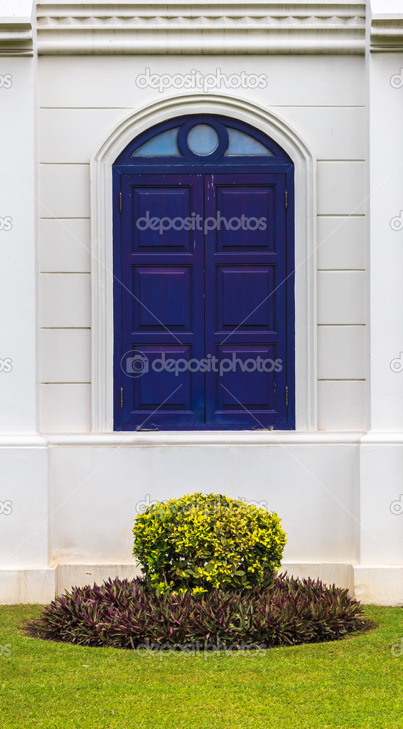 Arch Blue Window with Small Garden