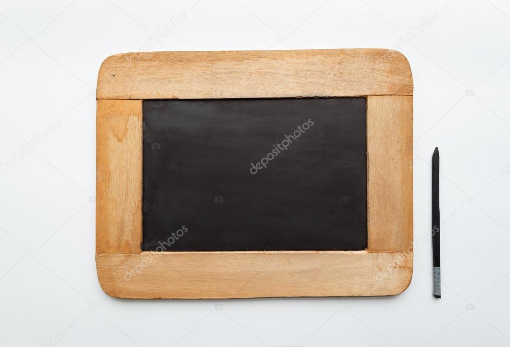 Old vintage wooden frame blank slate and pencil