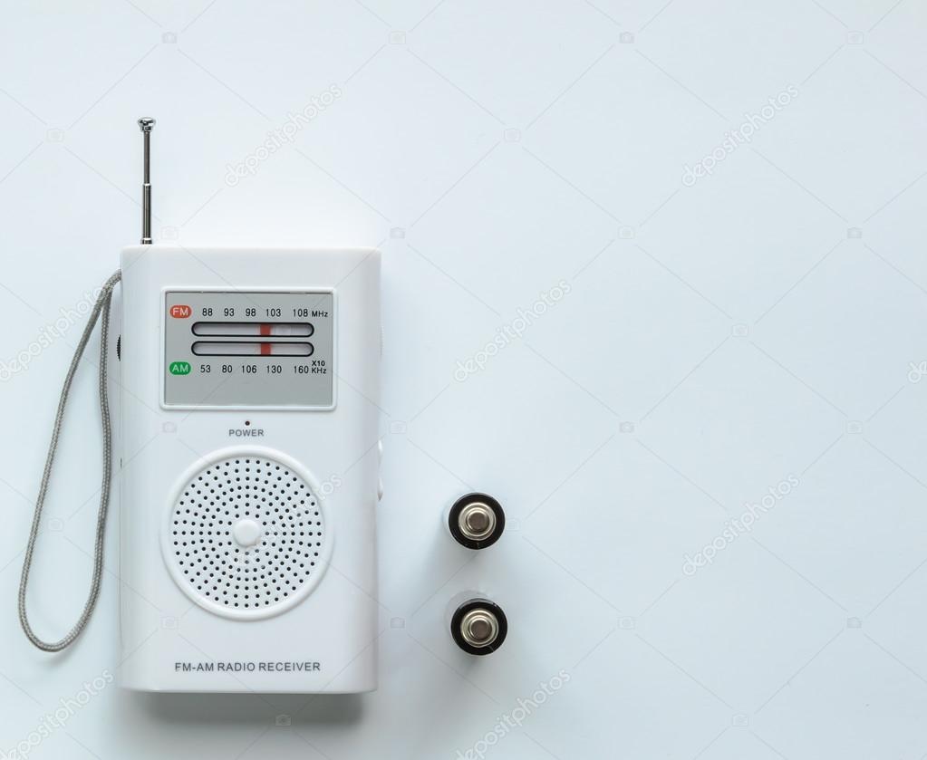 Small White Radio Receiver with two Batteries