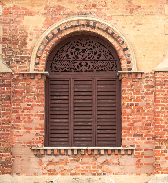 Old Wooden Arch Window