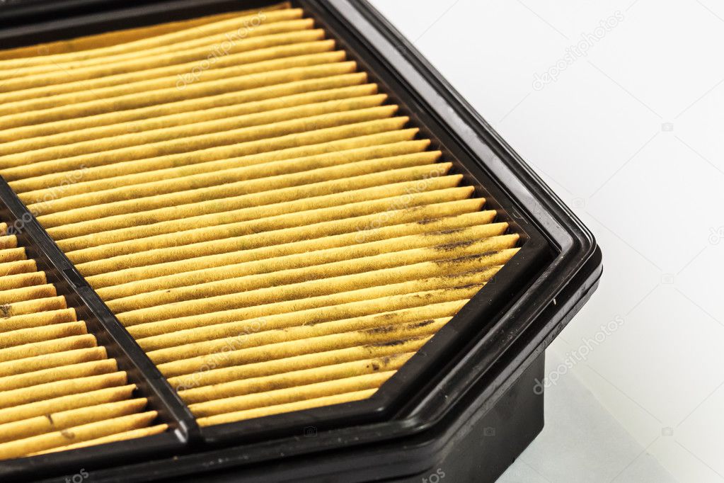 Dirty Air Filter Cartridge on White Background, Closeup