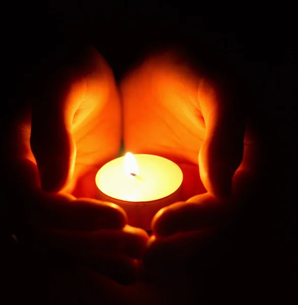 Candle in hand — Stock Photo, Image