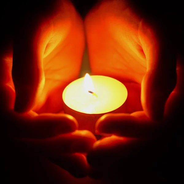 Candle in hand — Stock Photo, Image