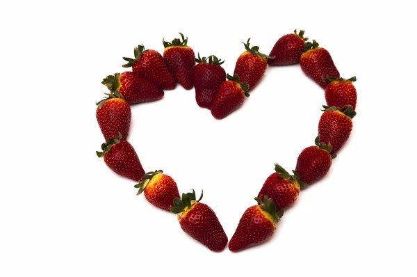 Fresh strawberries in heart shape — Stock Photo, Image