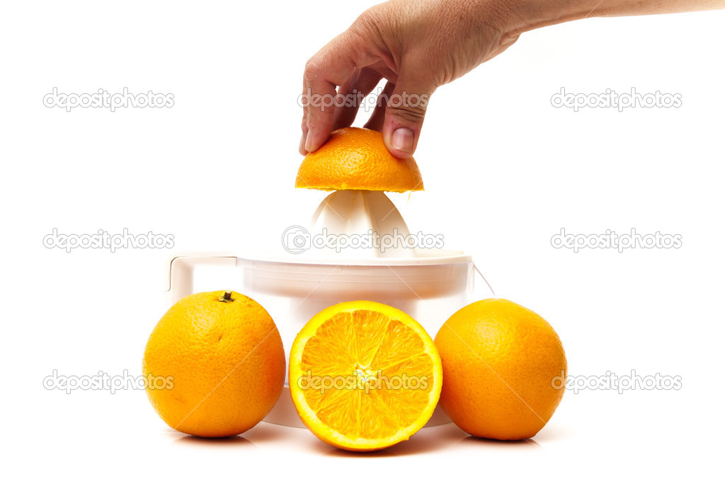 juicer with oranges