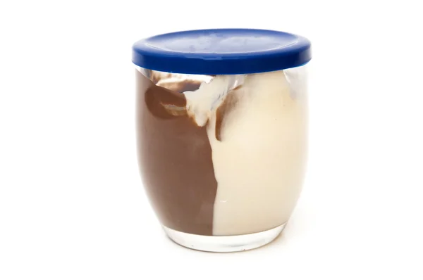 Glas witte chocolade en zwart — Stockfoto