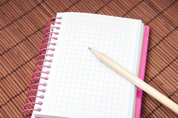 Notepad and pencil — Stock Photo, Image