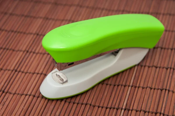 Green stapler — Stock Photo, Image