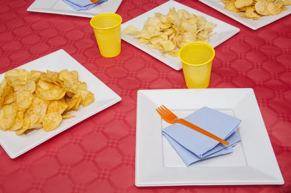 Table with dishes and glasses — Stock Photo, Image