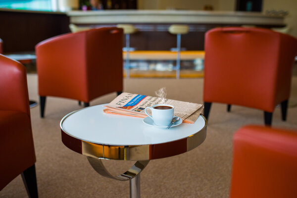 Газета и кофе
