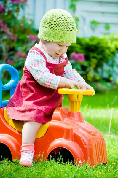 Baby on the car — Stock Photo, Image