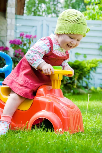 Baby on the car — Stock Photo, Image