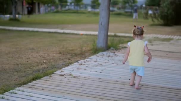 Happy Toddler Girl Jumping Barefoot Outdoors Park Happy Active Childhood — Stok video