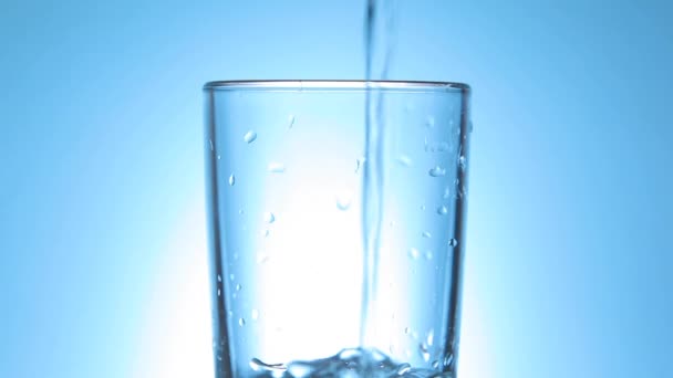 Clean drinking water in a glass close-up — Stock Video