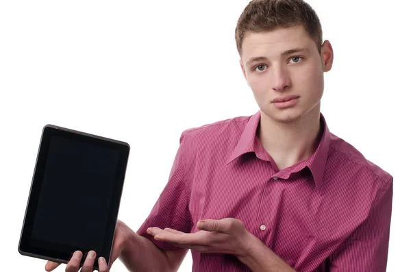 Jonge man die presenteert een tablet. — Stockfoto