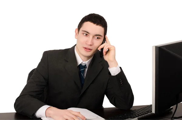 Business man sitting at desk talking on the phone. — Stock Photo, Image