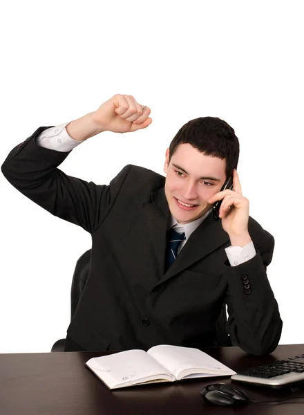 Homem de negócios com mão para cima alegre falando ao telefone . — Fotografia de Stock