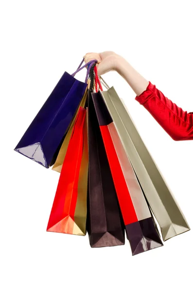 Female hand holding shopping bags. — Stock Photo, Image