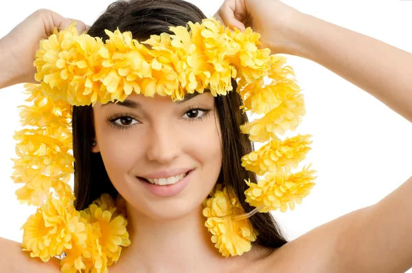 Hawaii woman showing a yellow flower lei garland. Stock Image