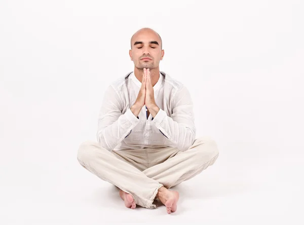 Man in yoga position. — Stock Photo, Image