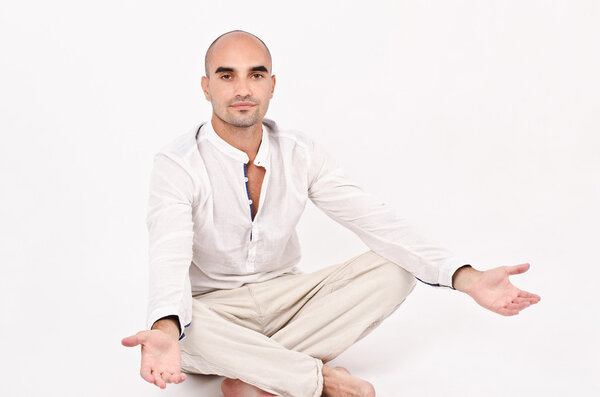 Man in yoga position.