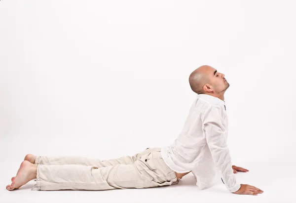 Man in yoga position. — Stock Photo, Image