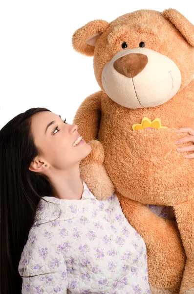Vacker tjej med en stor nallebjörn. — Stockfoto