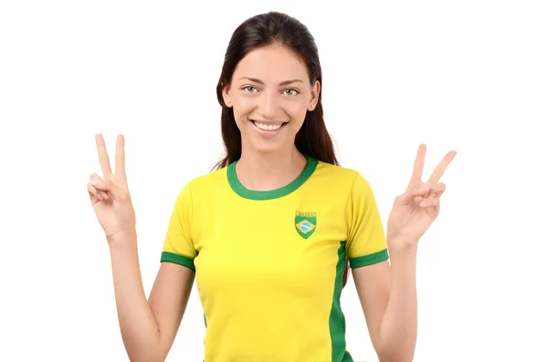 Meisje ondertekening overwinning voor Brazilië. — Stockfoto