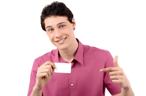 Man holding and pointing to a business card. — Stock Photo, Image