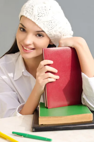 Beautiful student girl with books. Stock Image