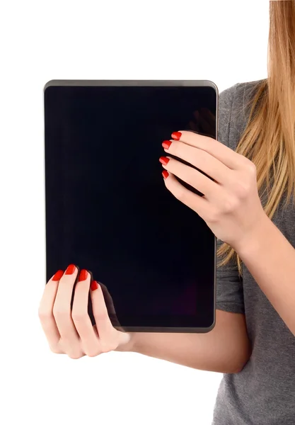 Z czerwony lakier do paznokci trzymając tabletkę z bliska na ręce seksowny. — Zdjęcie stockowe