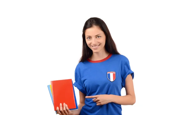 Estudante bonito apontando para a capa do livro em branco . — Fotografia de Stock