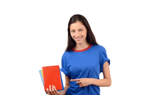 Piękną studentkę, wskazując na puste czerwone okładki. — Zdjęcie stockowe