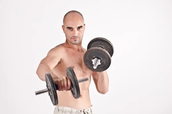 Strong man lifting weights. — Stock Photo, Image