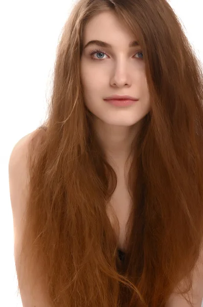 Portrait of a beautiful young woman with long brown hair. — Stock Photo, Image