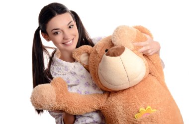 bir oyuncak ayı ile oynarken büyük oyuncak bear.happy esmer bir kız ile güzel bir kadın.