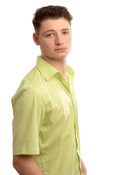 Retrato de um jovem homem de negócios vestindo uma camisa verde . — Fotografia de Stock