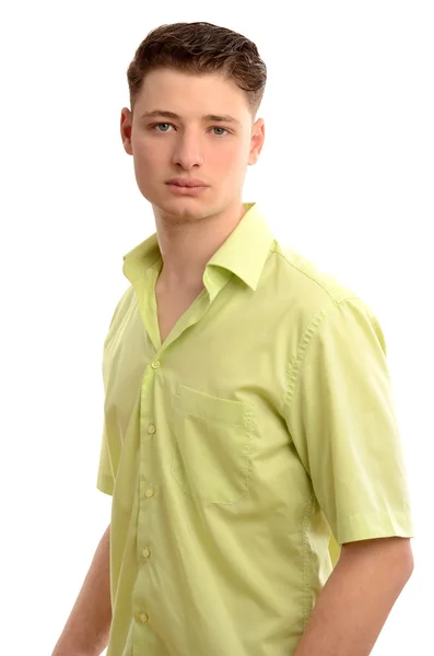 Portret van een jonge zakenman dragen van een groene shirt. — Stockfoto