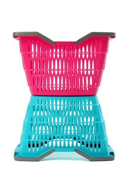 Blue and pink plastic shopping basket isolated on white. — Stock Photo, Image