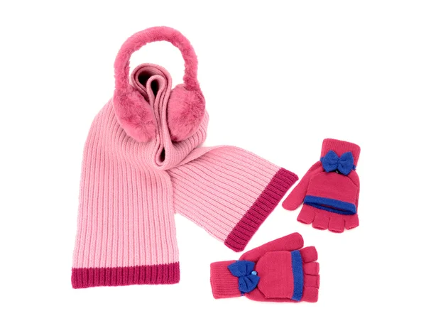 Pink wool scarf, a pair of gloves and earmuffs nicely arranged. — Stock Photo, Image